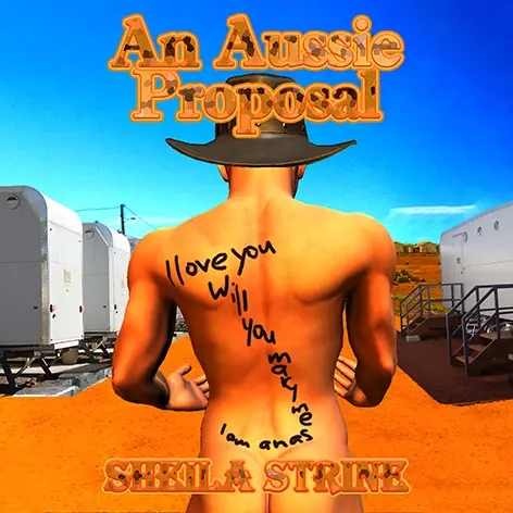Under a clear blue sky, a naked man stands on a large patch of red dirt with his back to us. In front of him are aluminium huts with steps.  The man wears a broad brimmed cowboy hat.  Words are written with marker on his back.  They say I love you.  Will you Mary me.  At the top of his buttocks are more words saying I am an as.  Text states An Aussie Proposal by Sheila Strine.